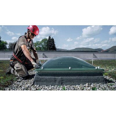 Man working on roof with ABS lifeline system