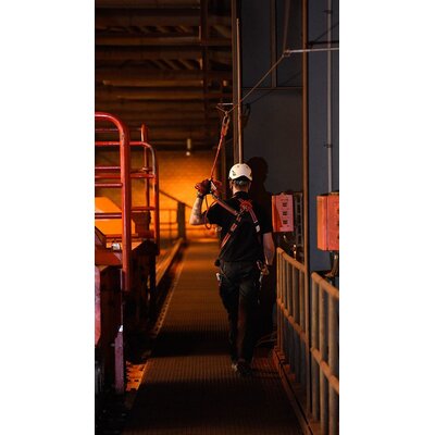 Man in a building with ABS lifeline system on