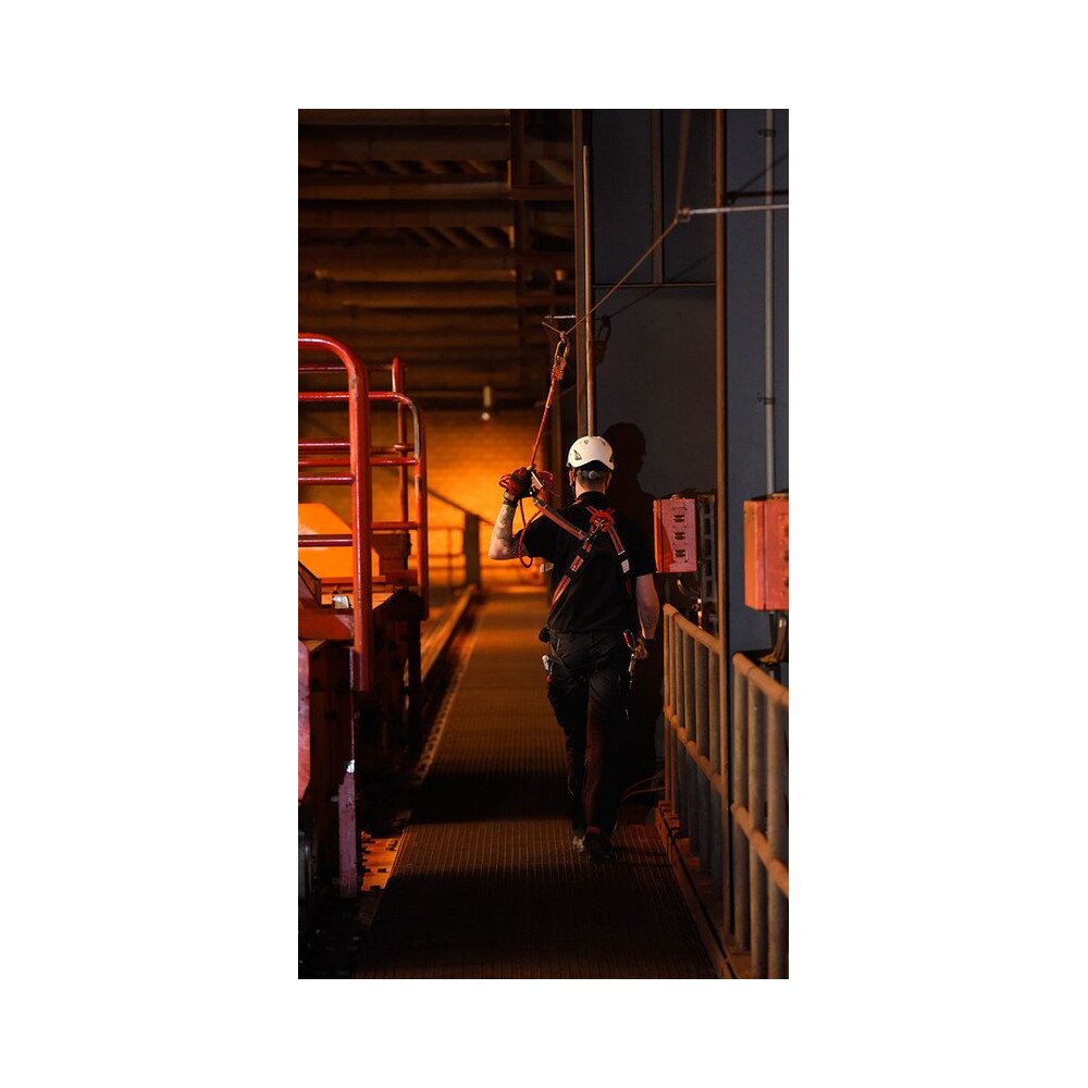 Man in a building with ABS lifeline system on