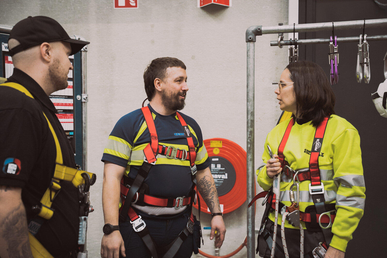 Service technicians wear equipment of fall protection